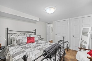 Comfort meets charm in this inviting queen bedroom, perfect for a relaxing getaway!
