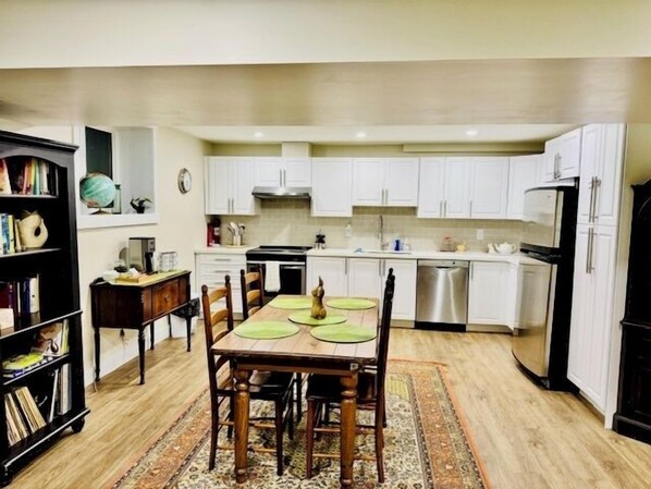 The open concept kitchen and dining area is very spacious.