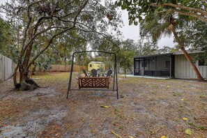 Swing, relax, and connect—backyard bliss awaits! 
