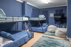 The third bedroom on the bottom floor has 2 twin-over-full sized beds.