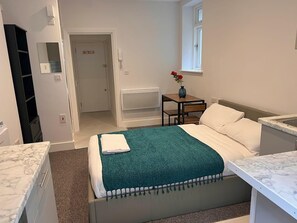 Discover the charm of simplicity in this cozy bedroom