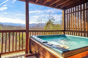 Soak all your cares away in the hot tub on the lower level deck!