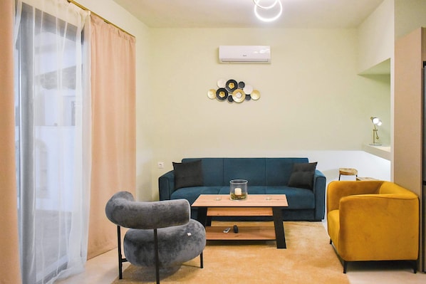 Bright and airy Living room with comfortable sofa bed 
