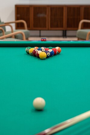 Rack ’em up and enjoy a game of pool in our inviting community game room—fun for players of all skill levels!