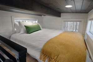 loft bedroom with queen mattress