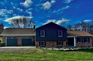 Blue skies highlight the beauty of this gem of a home.
