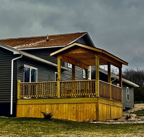 Newly added back deck for relaxing and taking in the beautiful views.