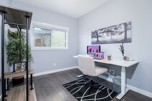 Spacious Office with adjustable desk, chair and extra monitor