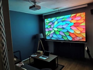 Bad weather outside? Close the shelters and watch a great movie on the theater system