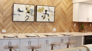 Breakfast bar comfortably seats four diners.