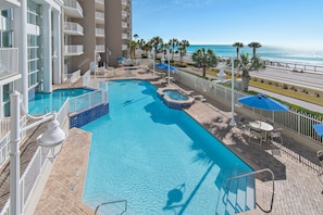 Majestic Sun has a large pool, two hot tubs on the elevated, and spacious patio with plenty of seating and shade overlooking the shimmering Gulf of Mexico.