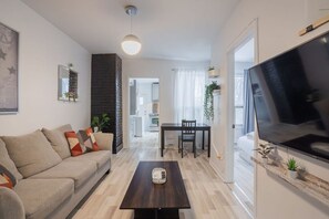 Chill on the comfy sofa and catch your favorite shows on the Smart HD TV with streaming services