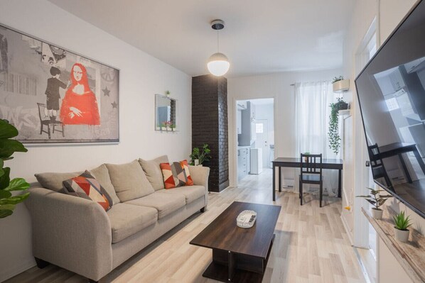Step into a bright, cozy living space that instantly makes you feel at home