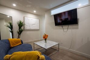 Relax and stream your favorites in this vibrant living space.