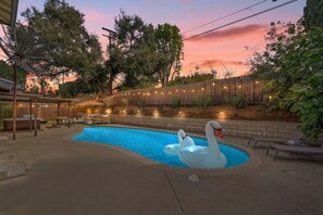 Spacious Pool with pool floaties and large backyard