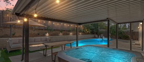 Pool. with Jacuzzi with outdoor patio area