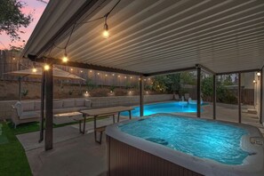 Pool. with Jacuzzi with outdoor patio area