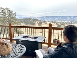 Enjoy morning coffee around the fire table while taking in the beautiful landscape