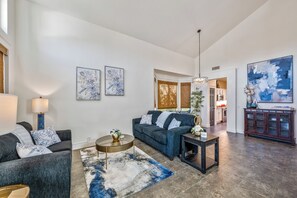 Open the front door to this elegant living room.