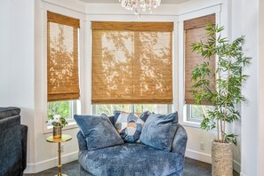 Cozy up with a book in this sweet nook.