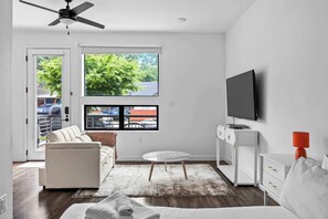 Unwind in the cozy living area, designed for comfort. Perfect for a laid-back retreat.