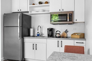Our charming kitchenette is designed to provide basic essentials for your stay!