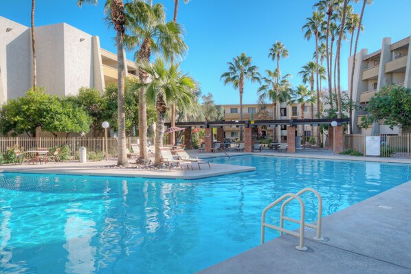 Immerse yourself in vacation bliss at our pool area. 
