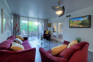 Welcome to the heart of our stylish retreat! Our living room exudes comfort and modern charm, featuring plush furnishings and contemporary decor. 
