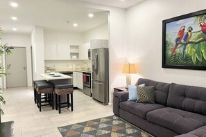 Unit 305 Living Lounge Area w/ Kitchen Island