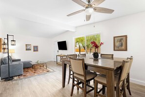 Cook, eat, and connect in this well-appointed kitchen and dining area