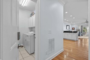 Laundry room with full size washer and dryer 