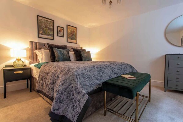 Spacious bedroom with superking bed or two singles and wardrobe and chest of drawers