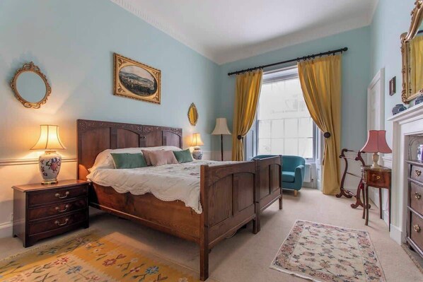 Fabulous hand carved King bed. Can be made into a twin if preferred. The bedroom is located at  the rear of the property so lovely and quiet