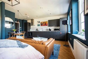 Open planned living, kitchen, dining and bedroom