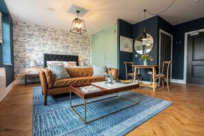 Open- planned living/ bedroom/dining room and kitchen