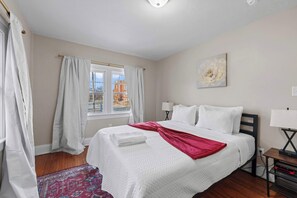 The third bedroom retreat features a plush queen-sized bed