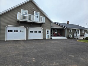 Loft apartment is above garage on the left.  Beautiful View of country side deck