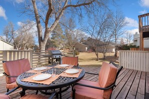 Patio with Outdoor Dining Area and BBQ Grill