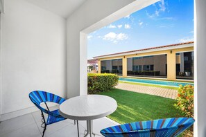 Outside patio lounge area, steps from the pool