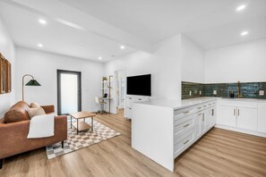 Relax and watch the Smart TV or get productive in the workspace area!