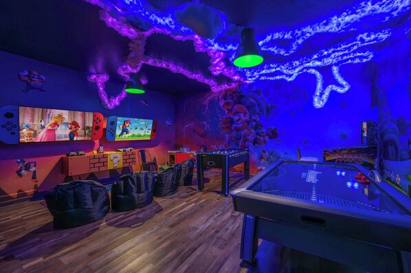 Welcome to Super Nintendo World!! Awesome game room with air hockey, foosball, multi-player arcade games, electronic pinball, PlayStation5 and XBox! 
