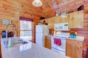 Fully equipped kitchen with Keurig, Coffee Pot, Creamer, Sugar and Coffee Pods
