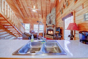 Mountain and Fireplace views while you prep for dinner!