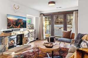 Gas fireplace and chair 1 right outside!
