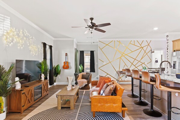 Strum a tune...unwind in the cozy embrace of this open-concept retreat.