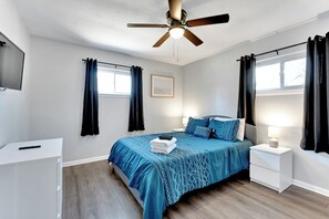 A queen bed perfect for relaxing after a day of fun in Virginia Beach.