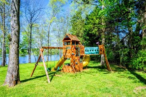 Our AWESOME play set!! Big kid swing, toddler swing, tunnel, slides, rock wall, sandbox etc!!