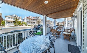Relax and unwind on this charming front porch