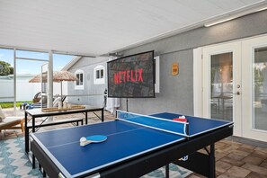Ping pong table and Netflix on the projector in our game room patio