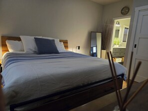 King bed, with main, full bathroom attached.
